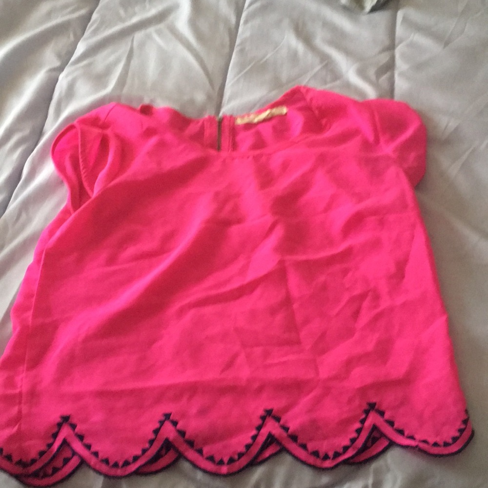 pink top with blue seam